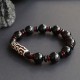 Black Onyx Nine-Eye Dzi Bead Wealth Bracelet