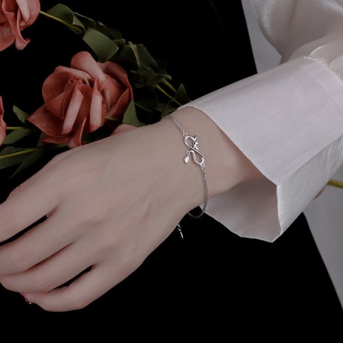 Year of the Dragon 999 Sterling Silver Zircon Knot Charm Bracelet Year of the Dragon 999 Sterling Silver Zircon Knot Charm Bracelet